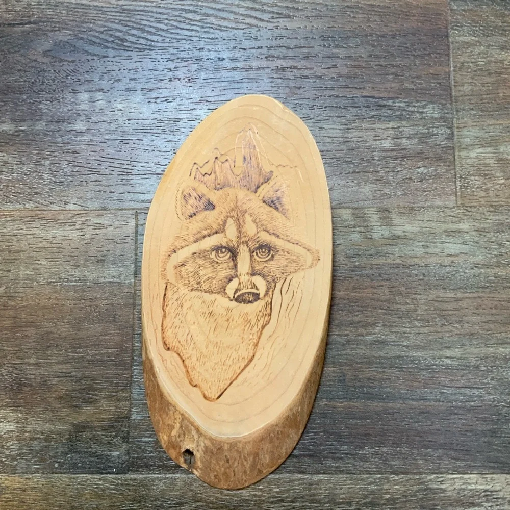 Raccoon wall sculpture burn etched wood slab plaque